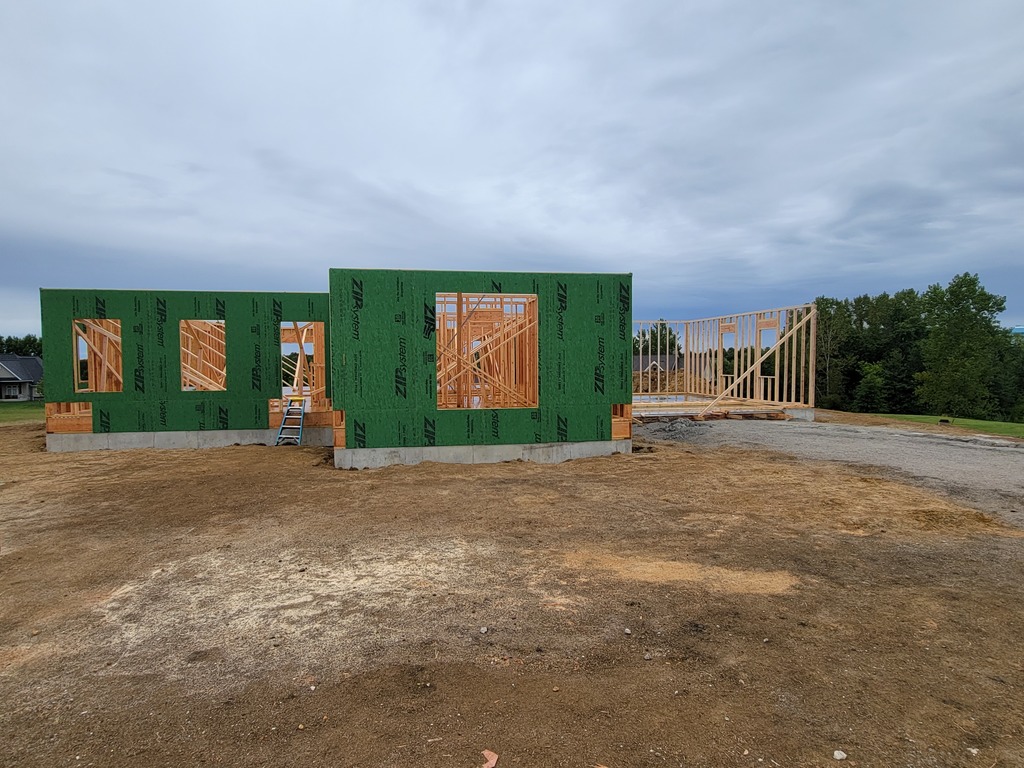 picture showing the walls up and installed on the building trades home